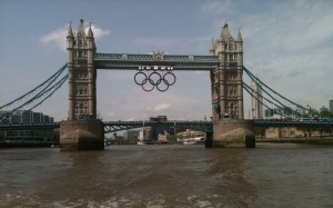 a bridge with olympic rings over it