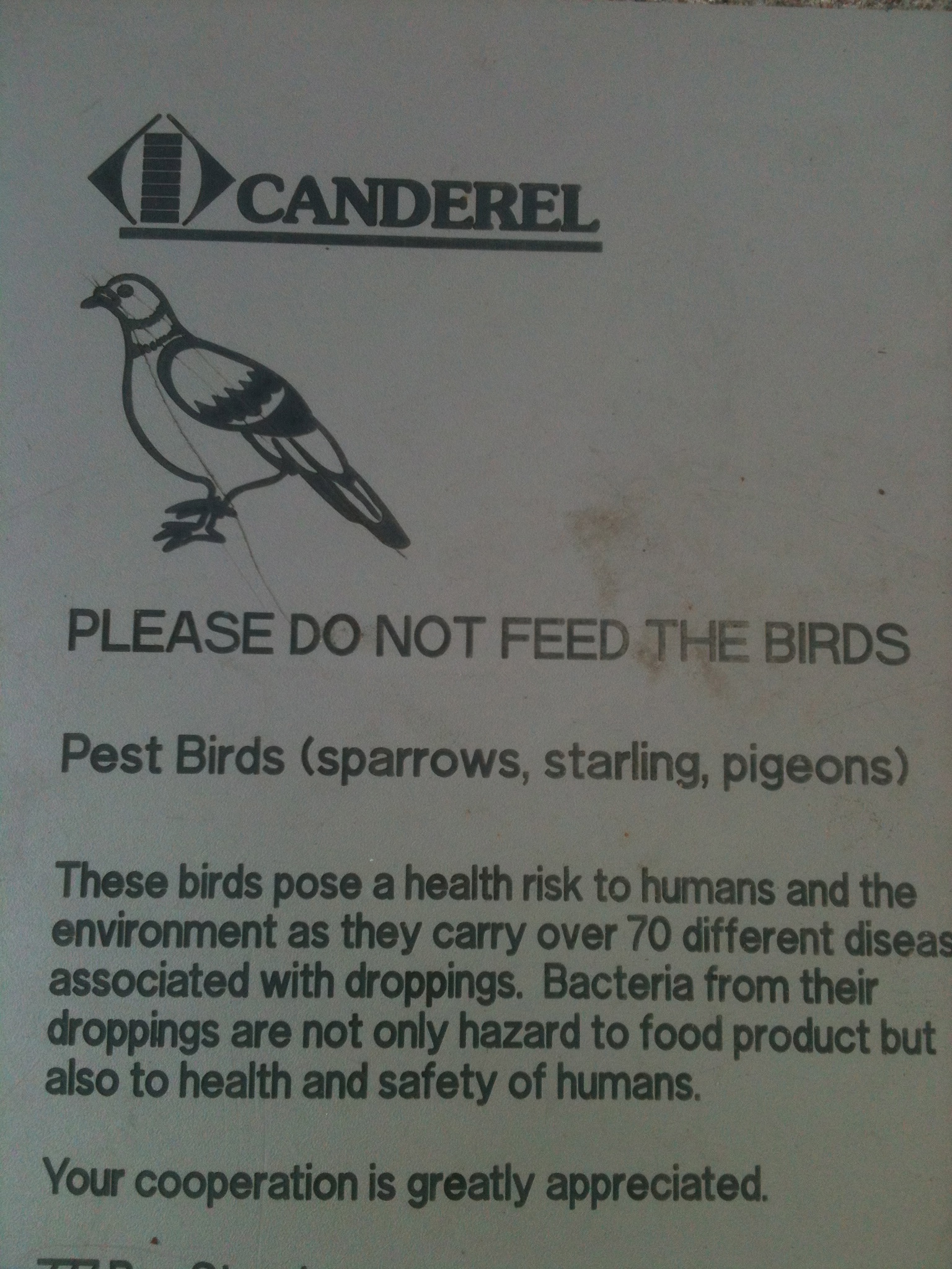 a sign with a bird on it