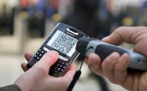 a person scanning a qr code on a cellphone