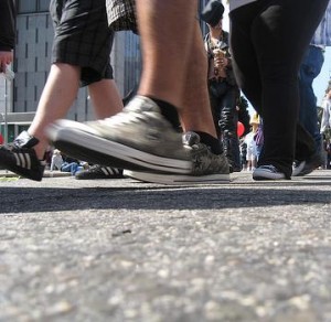 a close-up of a group of people walking