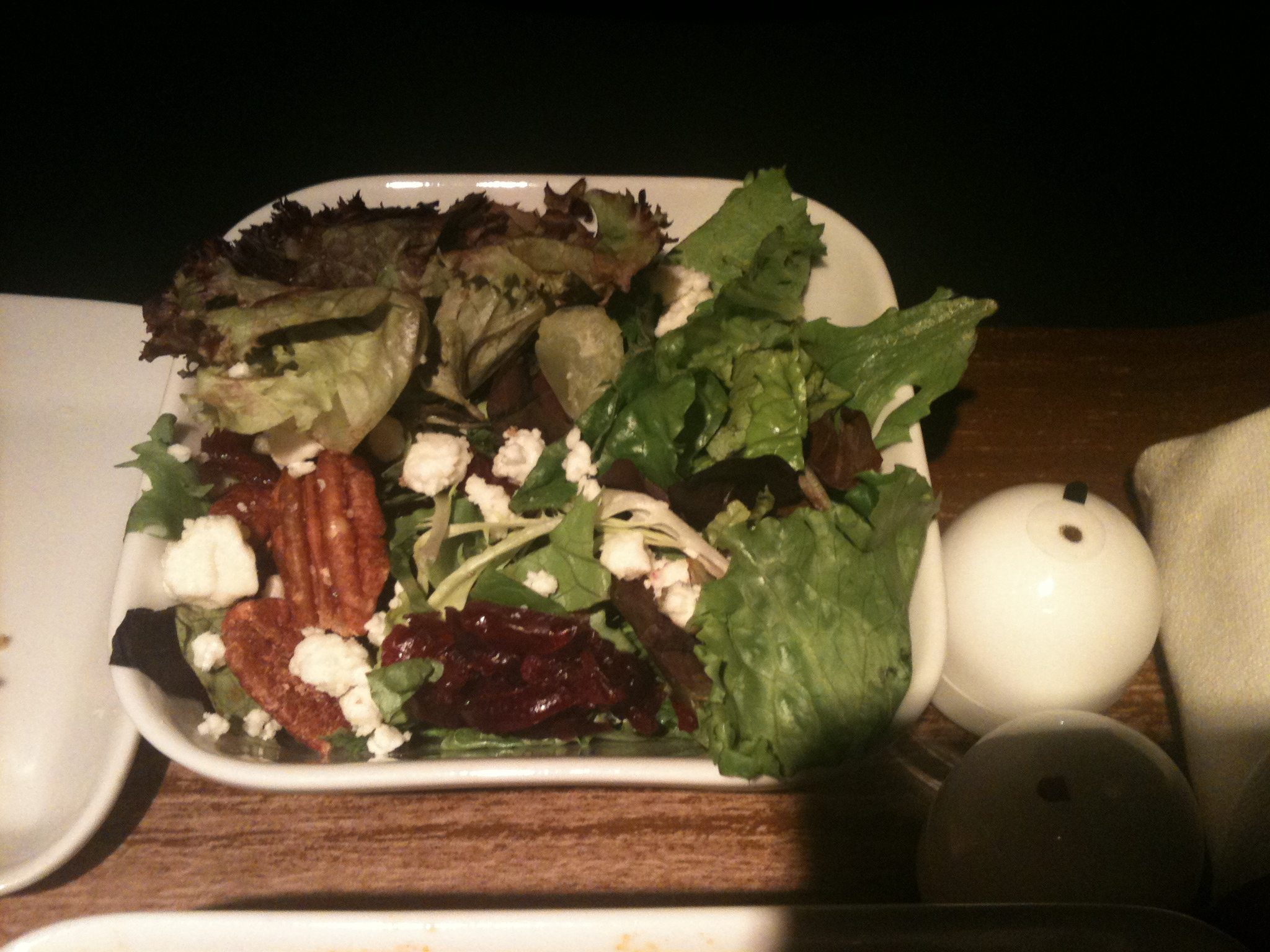 a bowl of salad on a table