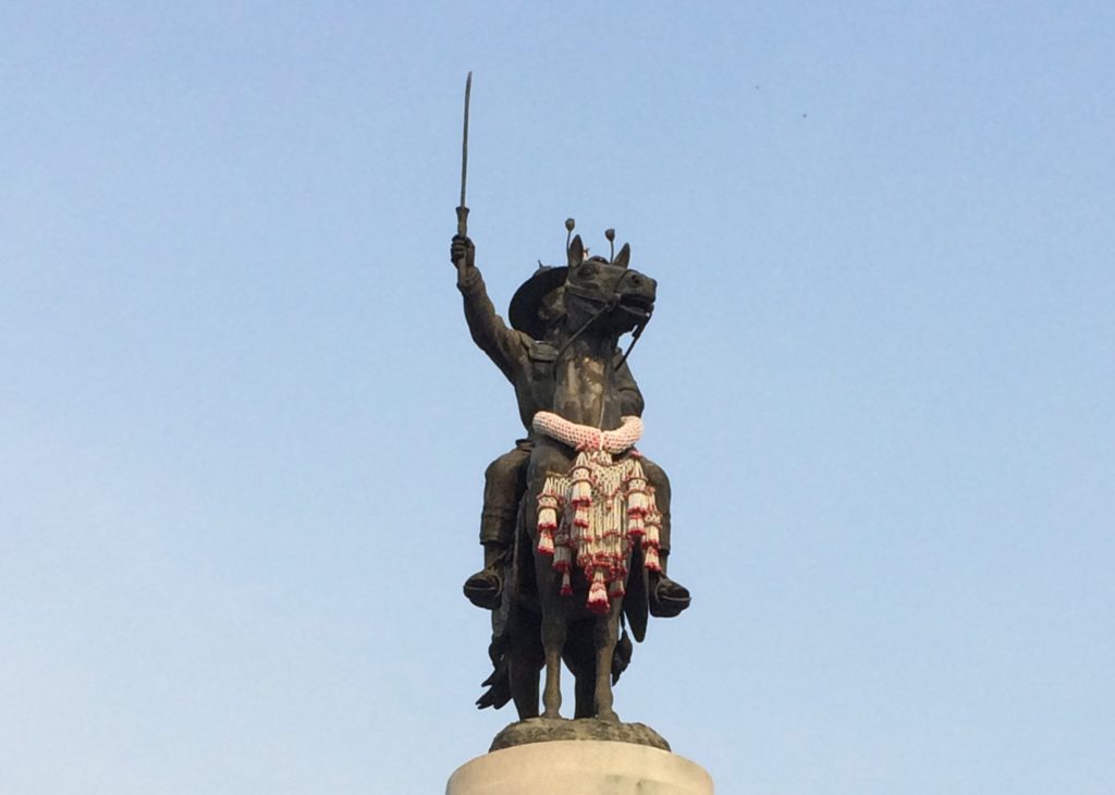 a statue of a man on a horse