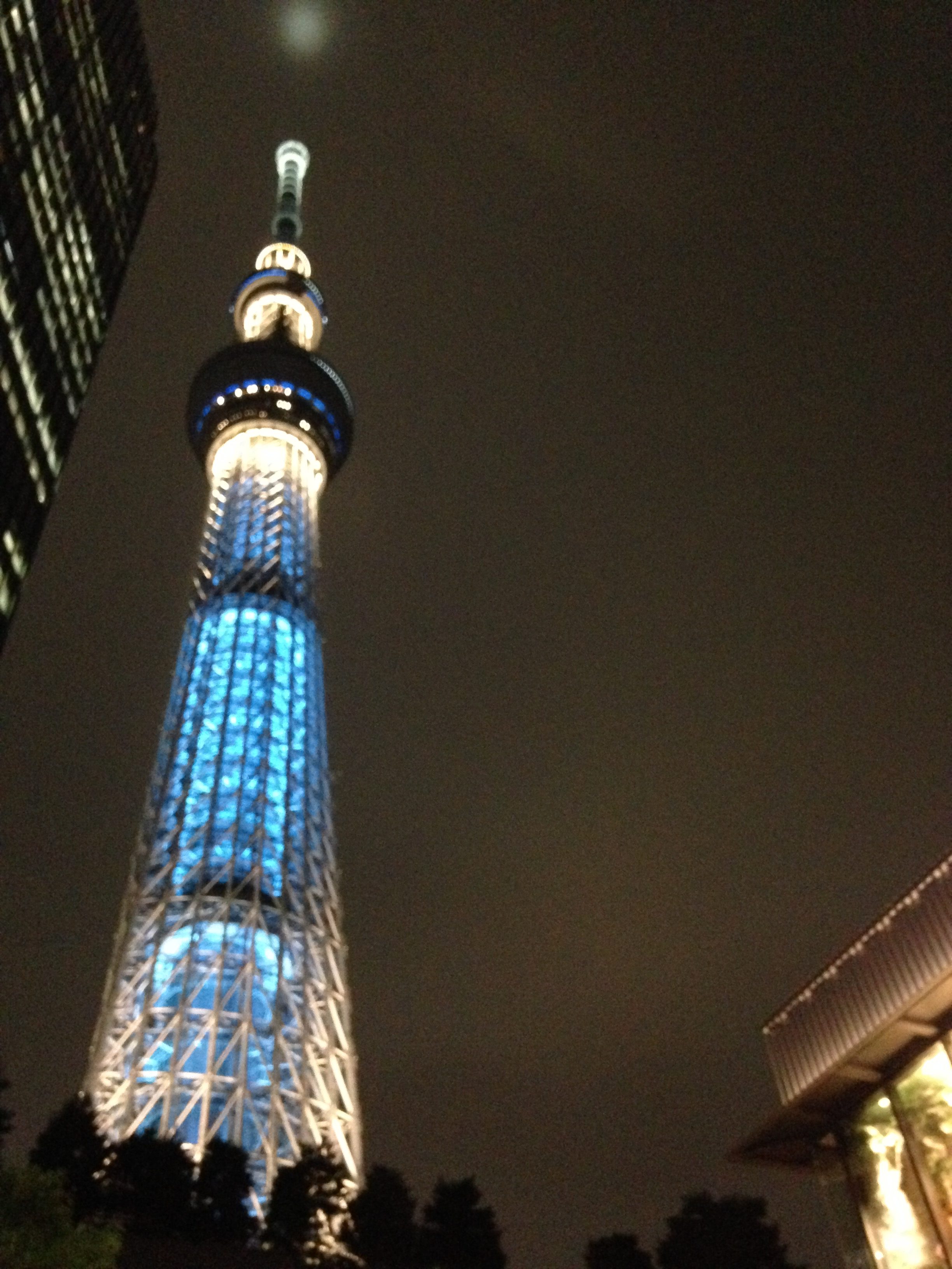 a tall tower with blue lights
