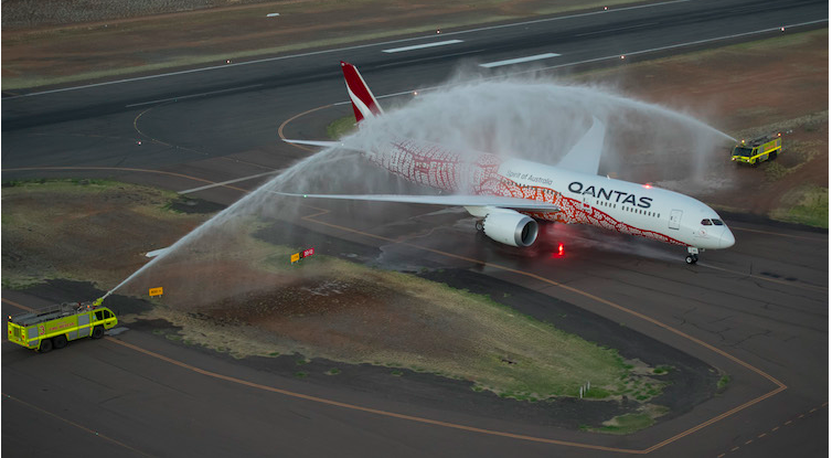 a jet spraying water on a runway