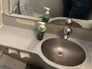 a sink with soap dispensers on it