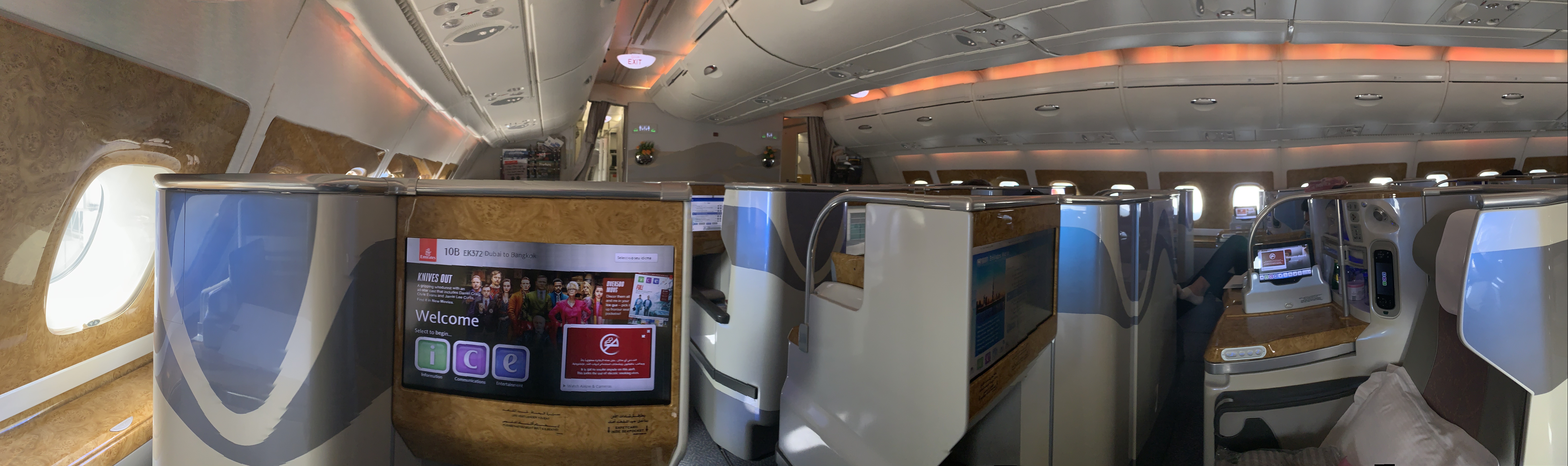 a plane with seats and a screen
