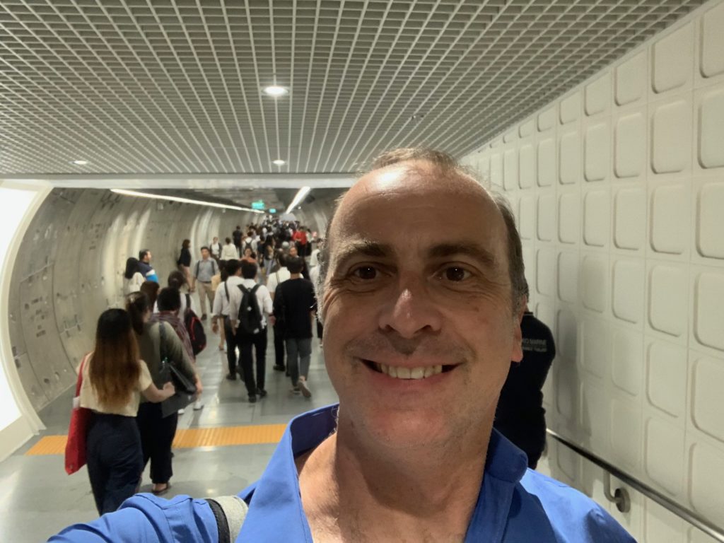 a man taking a selfie in a tunnel