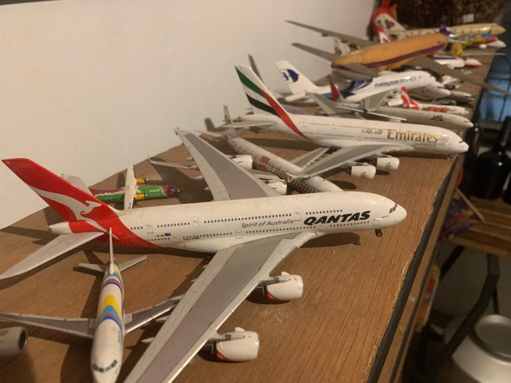 a group of model airplanes on a table