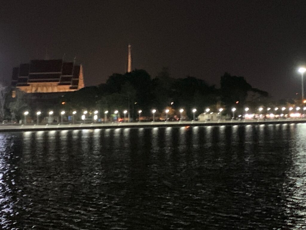a body of water with lights on it