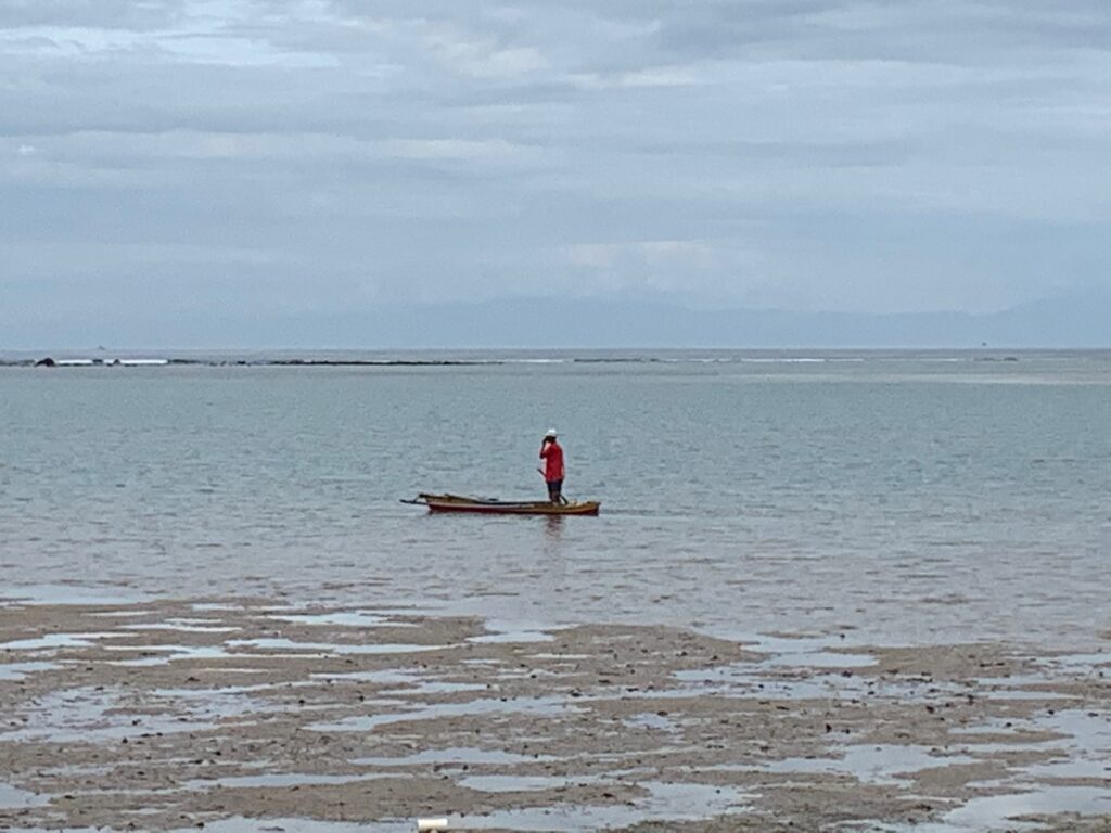 a person in a boat in the water