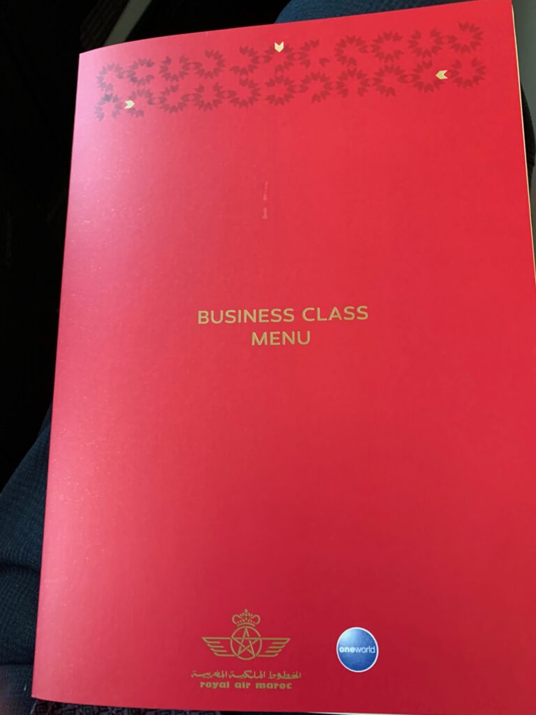 a red menu with gold text