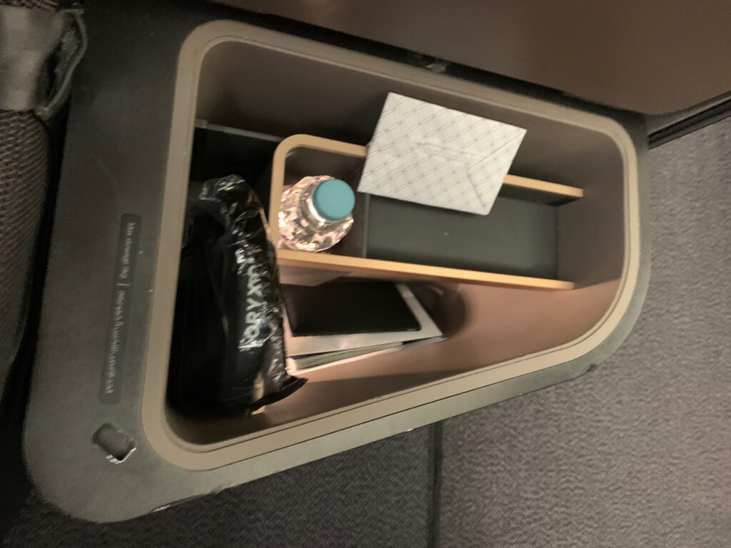 a trash can with objects inside