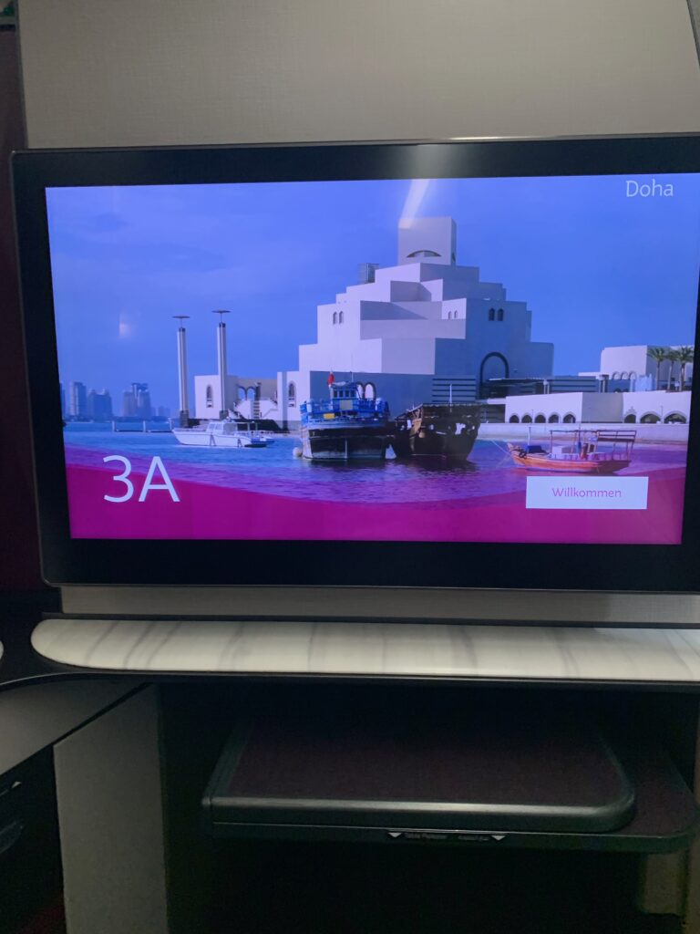 a television screen with a picture of a city