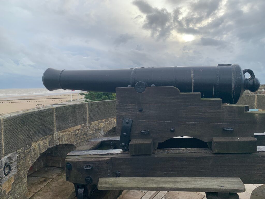 a cannon on a wooden platform