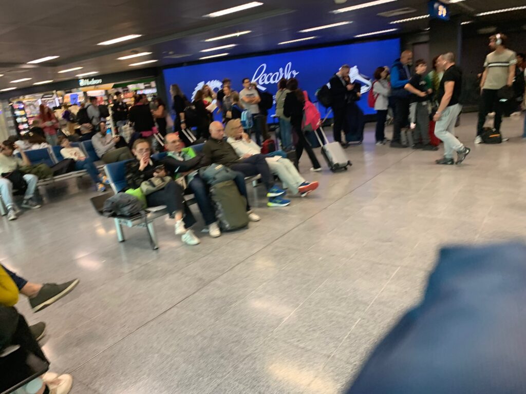 a group of people in a terminal