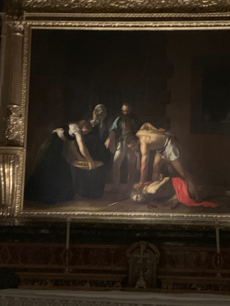 a painting of a man lying on his head