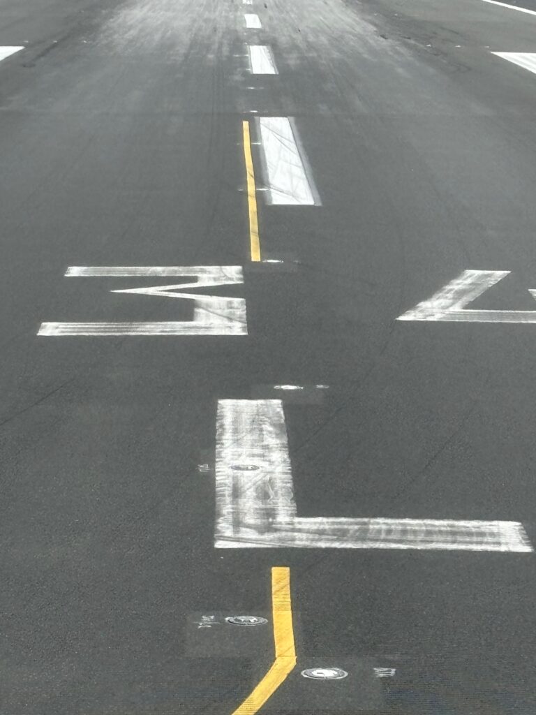 a road with white markings