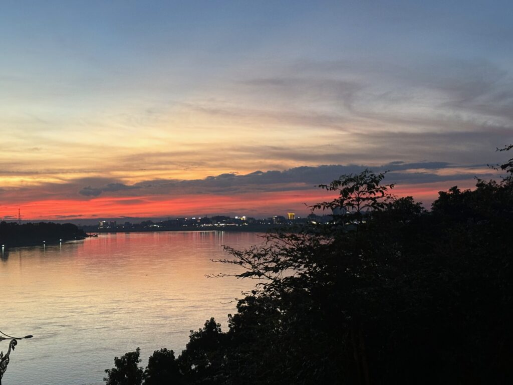 a sunset over a body of water