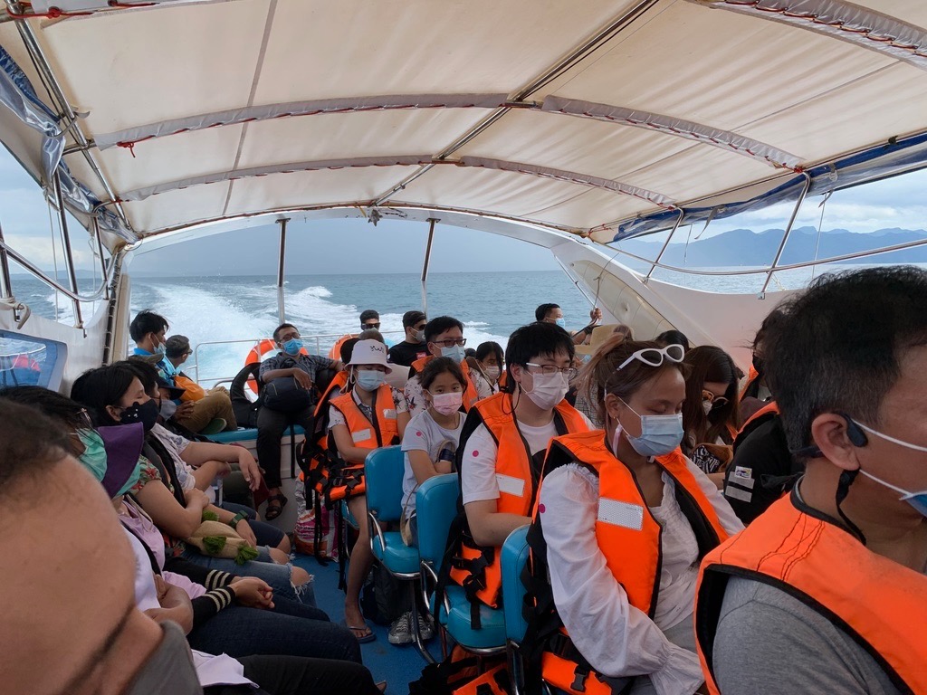 a group of people on a boat