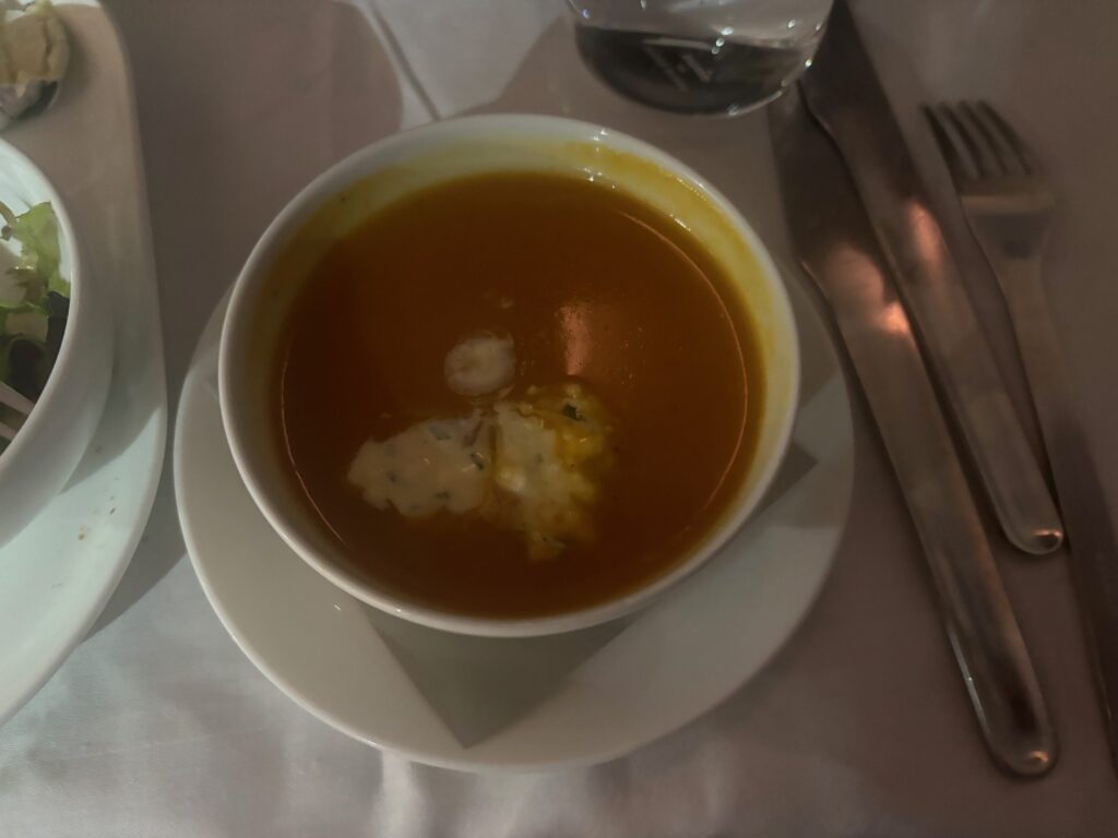 a bowl of soup on a plate