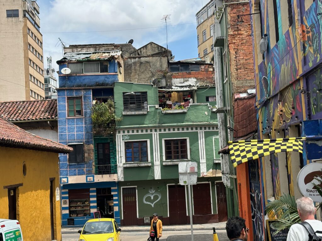 a street with buildings and cars