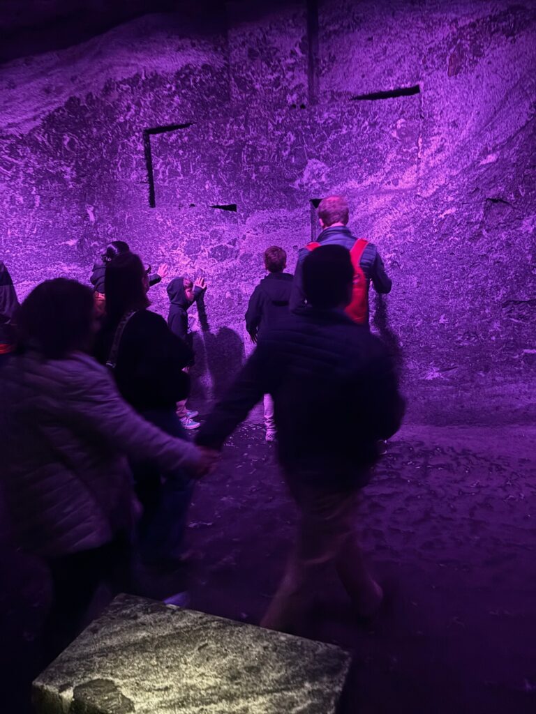 a group of people in a cave