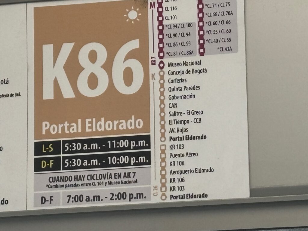 a sign with a number and time