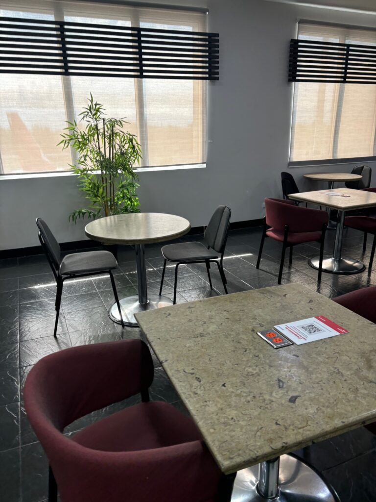 a room with tables and chairs