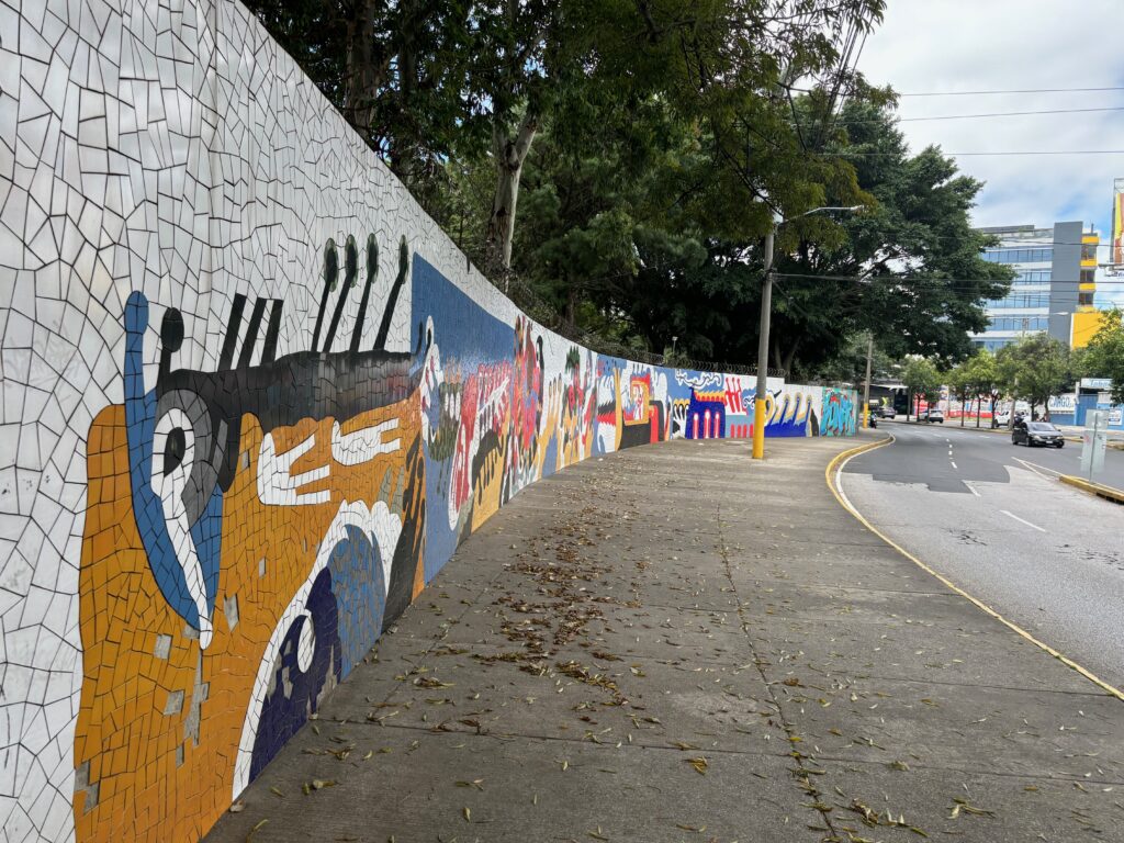 a wall with mosaic art on it