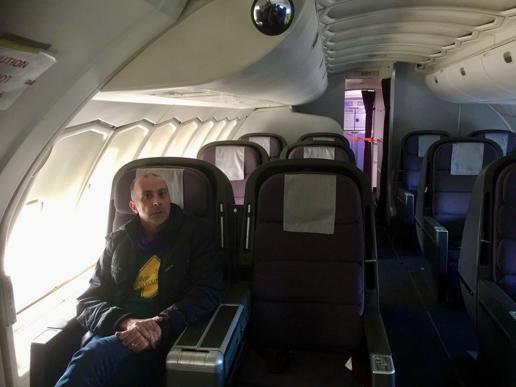 a man sitting in a plane