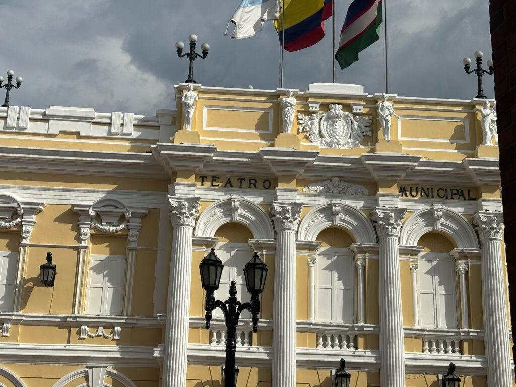 a building with many flags on top