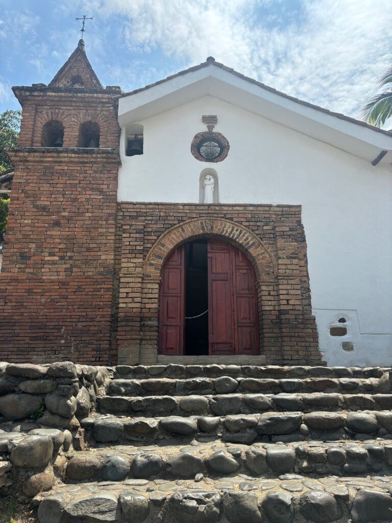 a brick building with a stone staircase