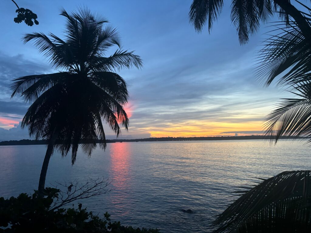 a sunset over a body of water