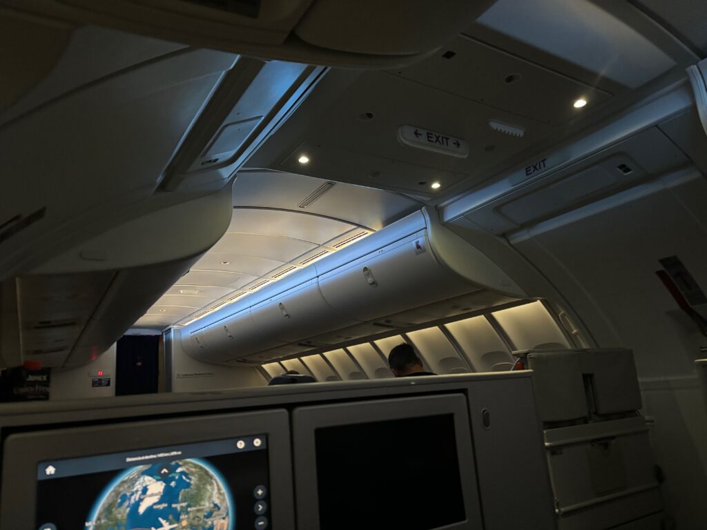 an airplane with a screen and a television