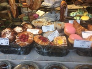 a display case with pastries and pastries