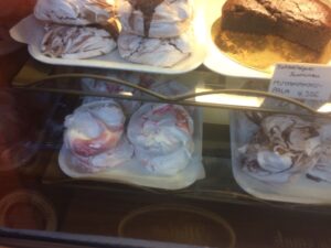 a glass case with food on it