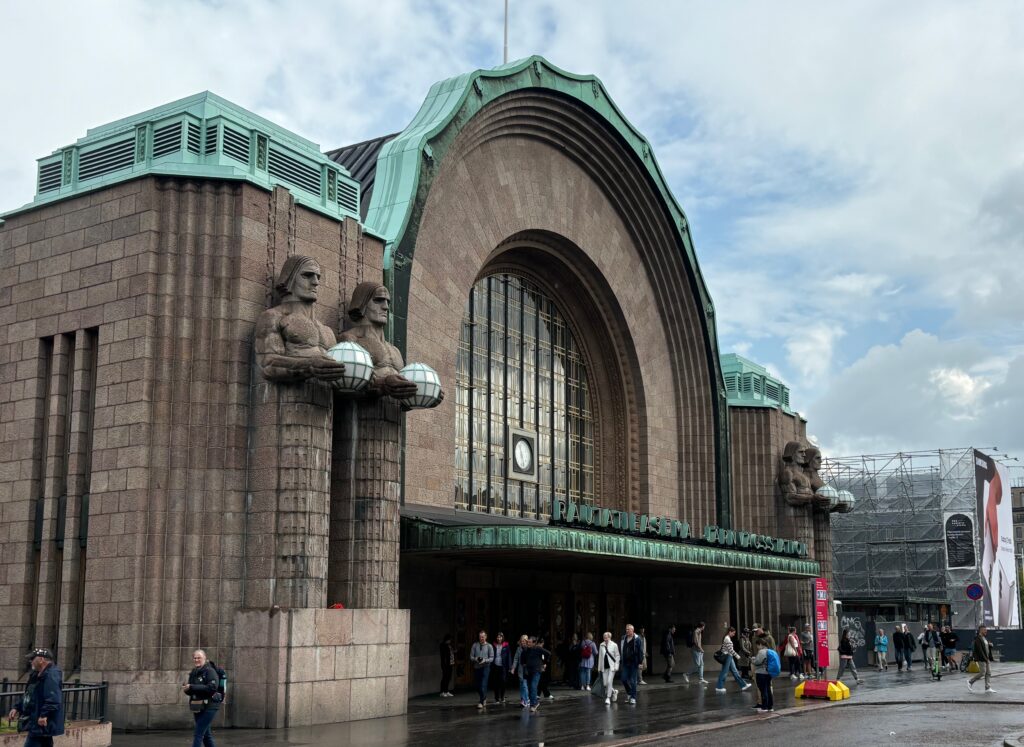 a building with statues on the side