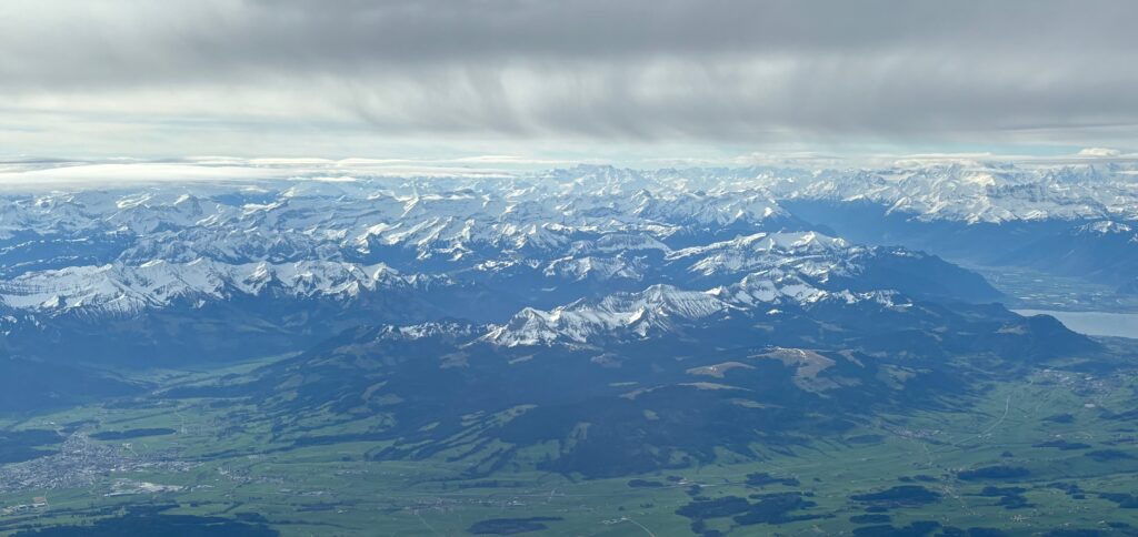 a aerial view of a snowy mountain range