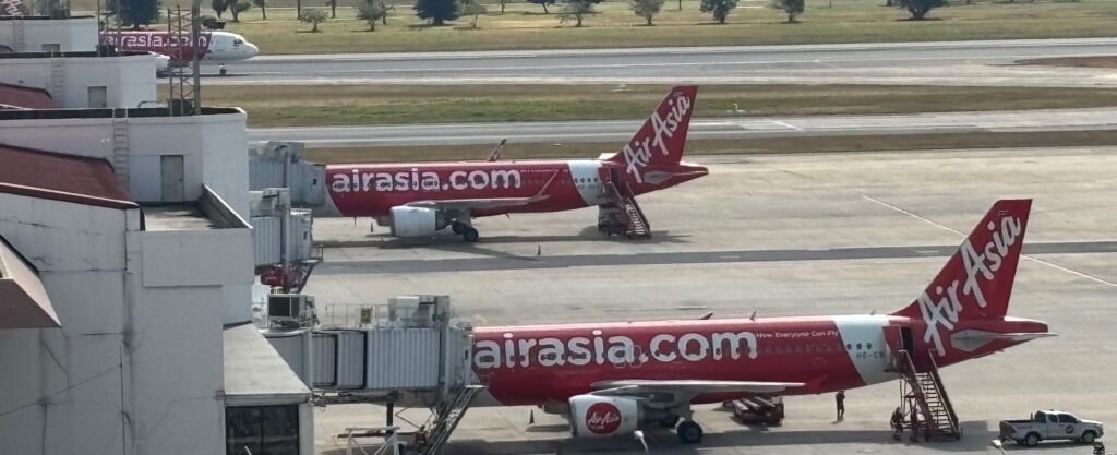 two airplanes on a runway