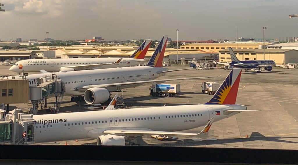 airplanes parked at an airport