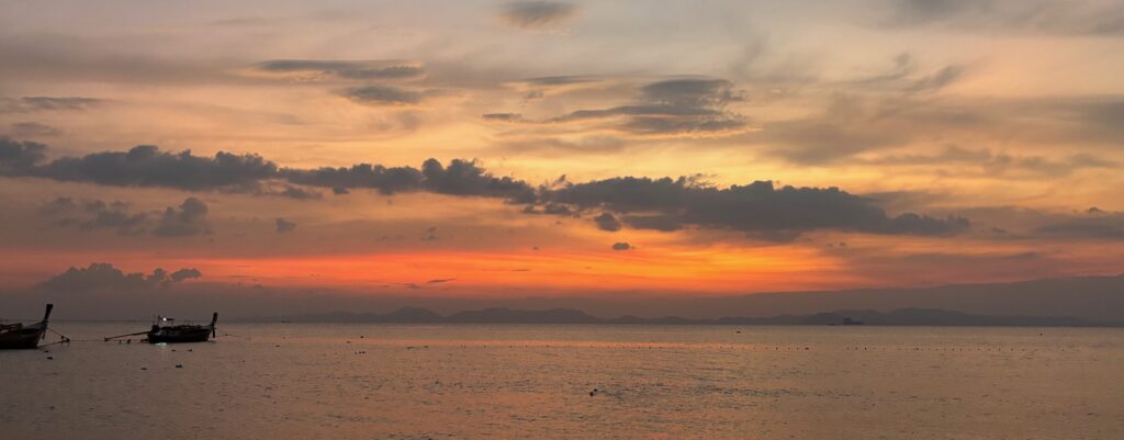 a sunset over a body of water