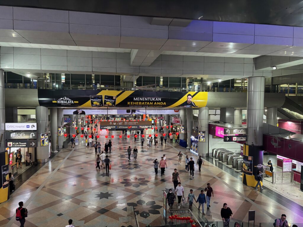 a large hall with people walking around