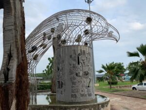 a sculpture of a bird with a bird head