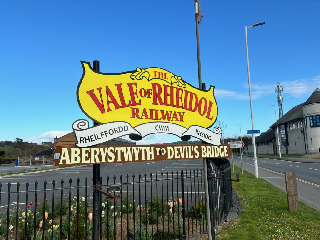 a sign on a fence