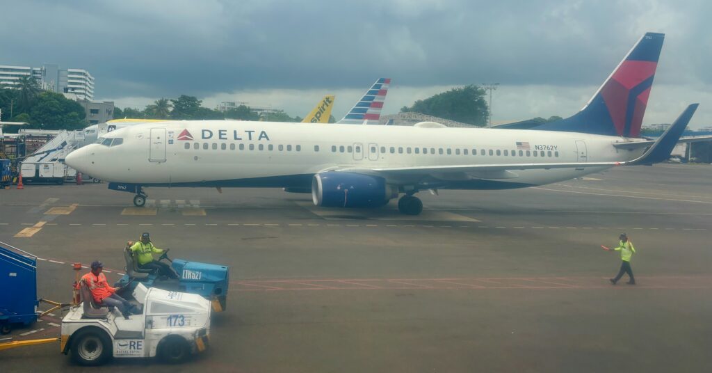 a large white airplane on a tarmac