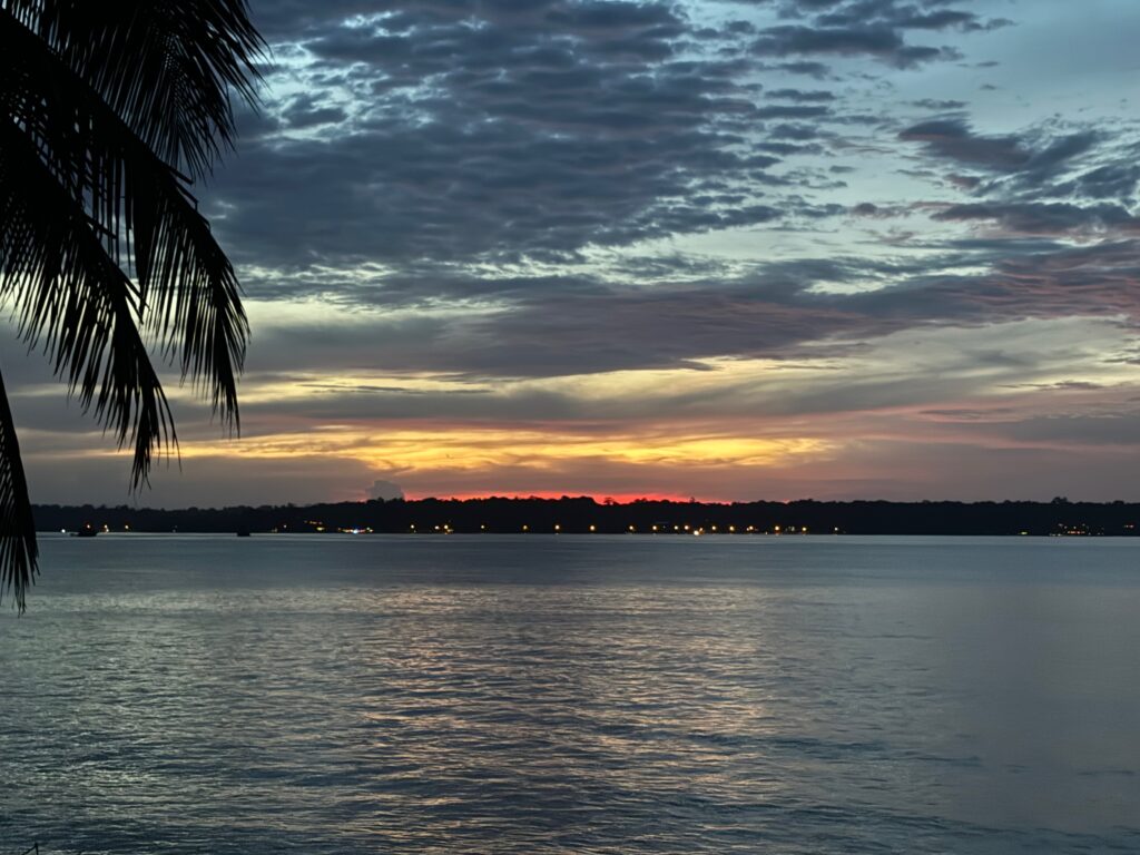 a sunset over a body of water