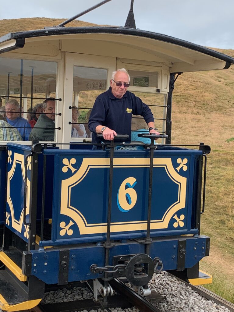 a man standing on a train