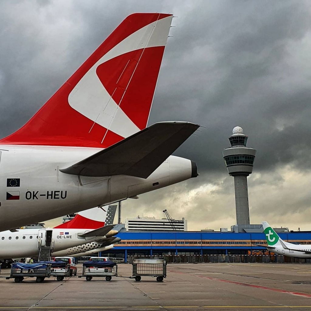 airplanes parked at an airport