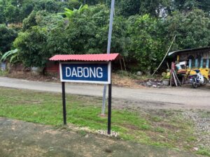 a sign on the side of a road