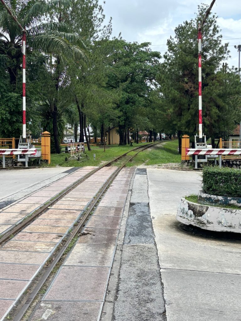 a train tracks with a barrier